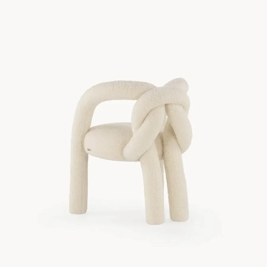 Exceptional Visionnaire Shibari chair with enveloping form, textured stretch fabric and curved tubular metal legs