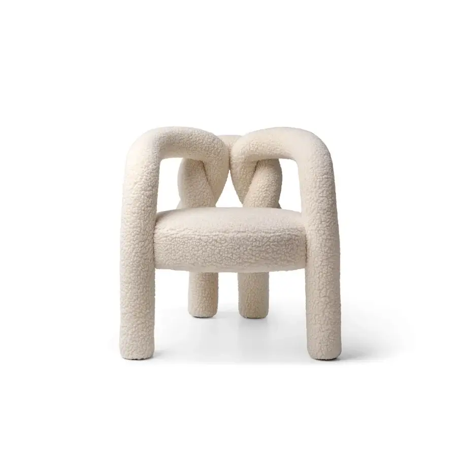Distinguished Visionnaire Shibari lounge chair with fully padded frame upholstered in tactile recycled PET stretch fabric and curved metal finish