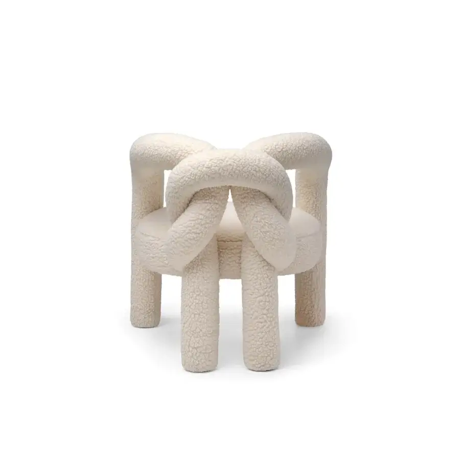 Superior Visionnaire Shibari lounge chair with curved metal frame fully padded and upholstered in textured recycled PET “Paddington” fabric with powder-coated finish