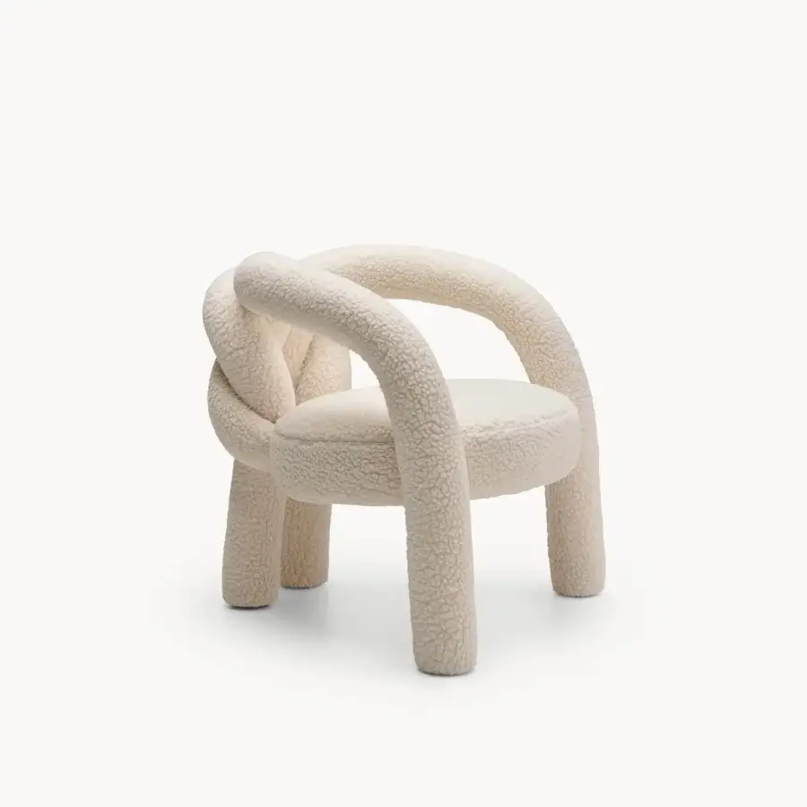 Exceptional Visionnaire Shibari lounge chair with curved metal frame upholstered in textured recycled PET “Paddington” fabric