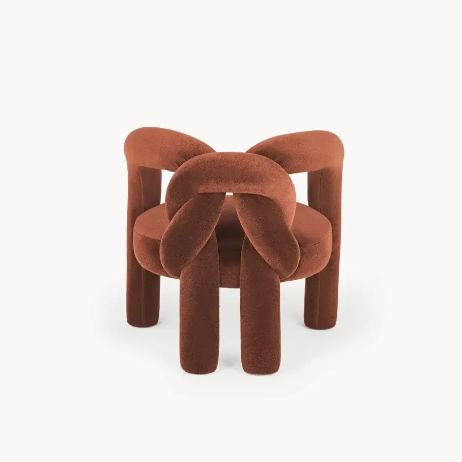 Superior Visionnaire Shibari lounge chair with knotted structure upholstered in reddish-brown recycled fabric and powder-coated finish