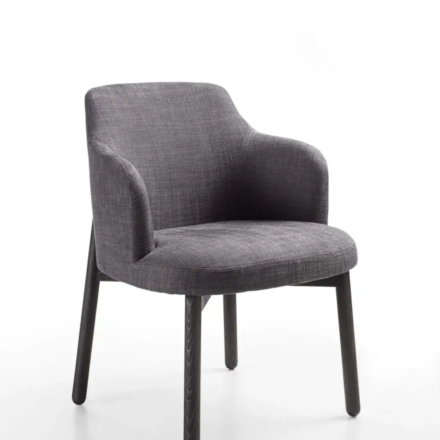 Distinguished Porada Abby chair with gently contoured gray textured textile and matte Canaletto walnut frame