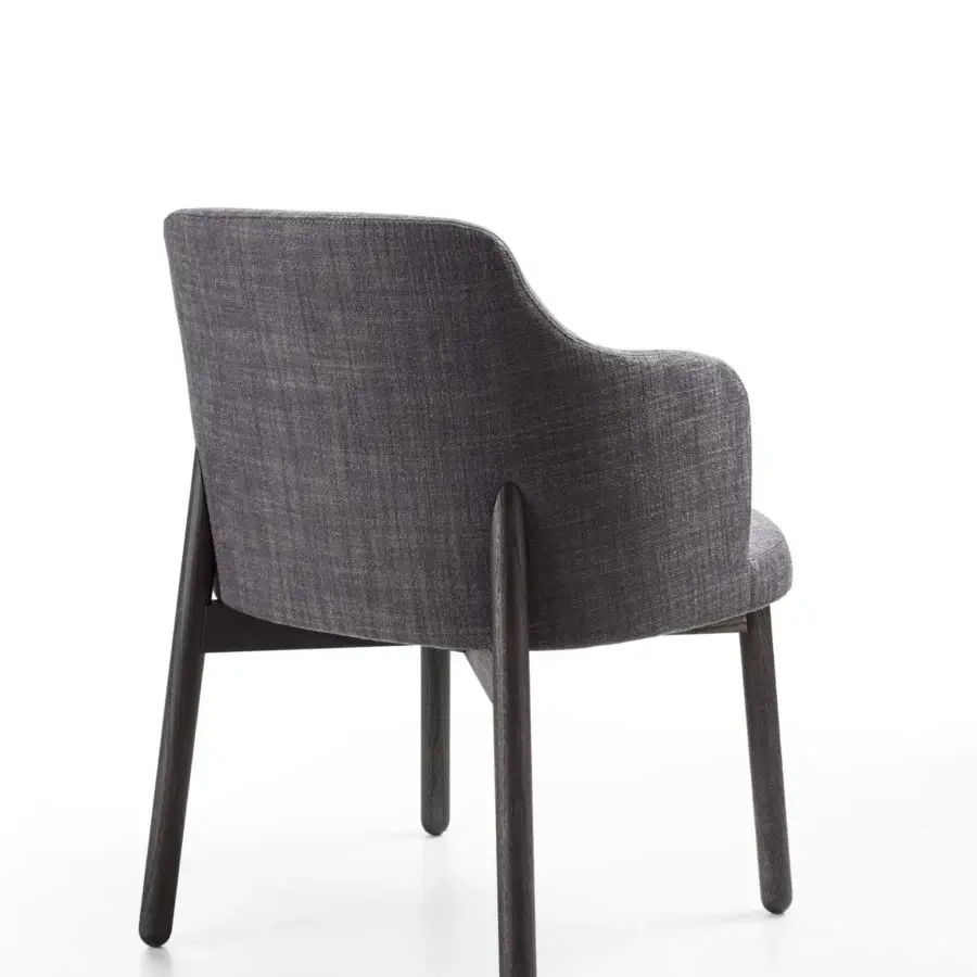 Exceptional Porada Abby chair with solid Canaletto walnut frame and dark gray patterned textile upholstery