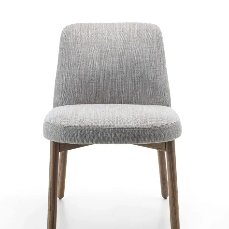 Exceptional Porada Abby chair crafted with a muted gray textured textile seat and solid Canaletto walnut frame with satin finish