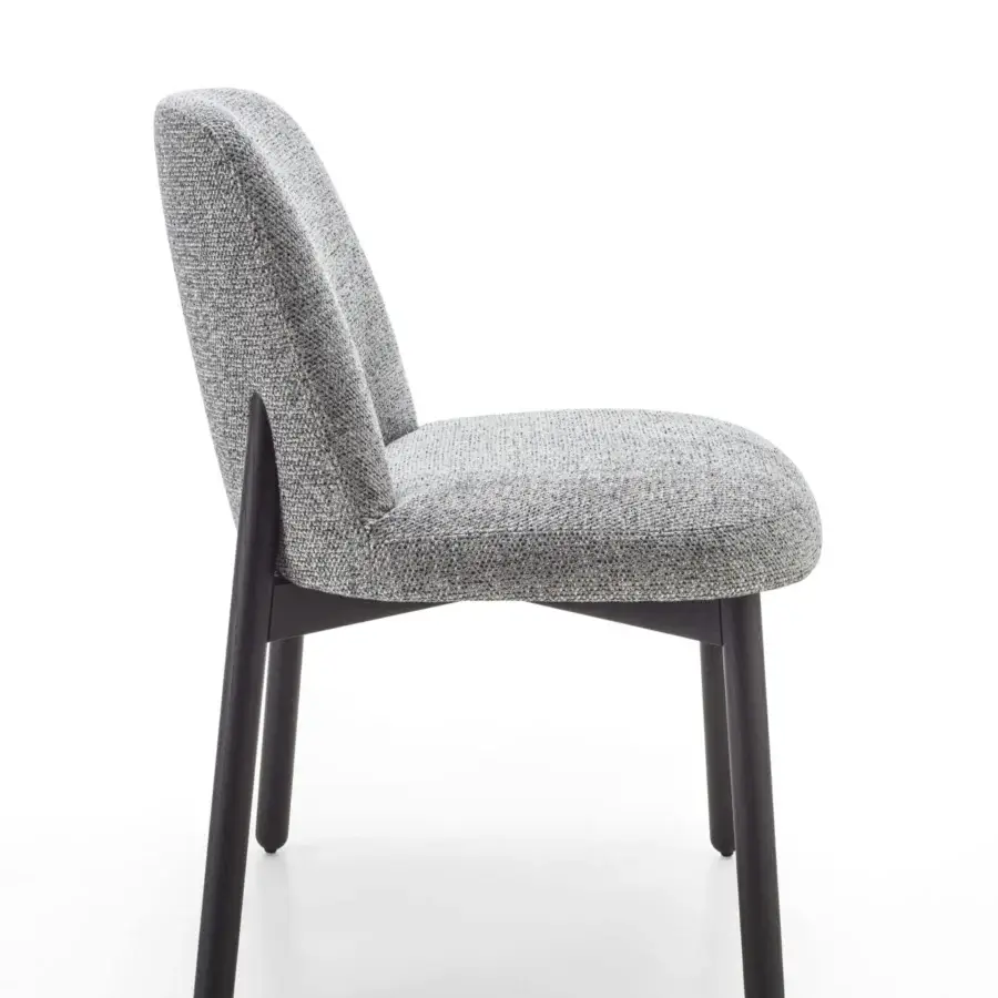 Distinguished Porada Abby chair with a gently curved Canaletto walnut frame and muted gray textured fabric upholstery with matte finish