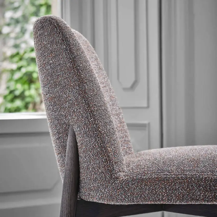 Superior Porada Abby chair with a gently curved Canaletto walnut frame and speckled gray-brown textile upholstery with satin finish