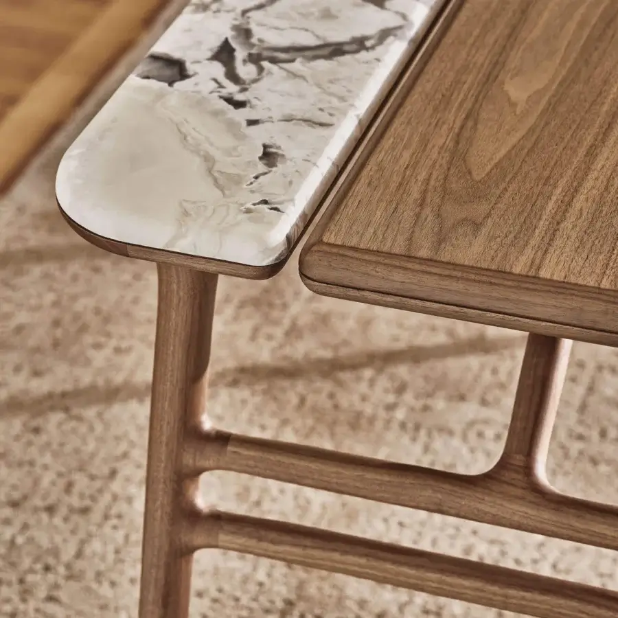 Distinguished Porada Aksel desk crafted in solid Canaletto walnut with a cool light grey marble top and subtle integrated cable management
