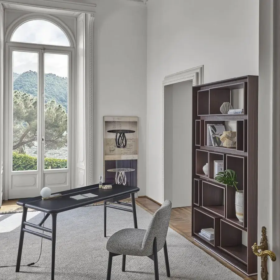 Distinguished Porada Aksel desk crafted in solid Canaletto walnut with a satin finish and outward-angled black metal legs