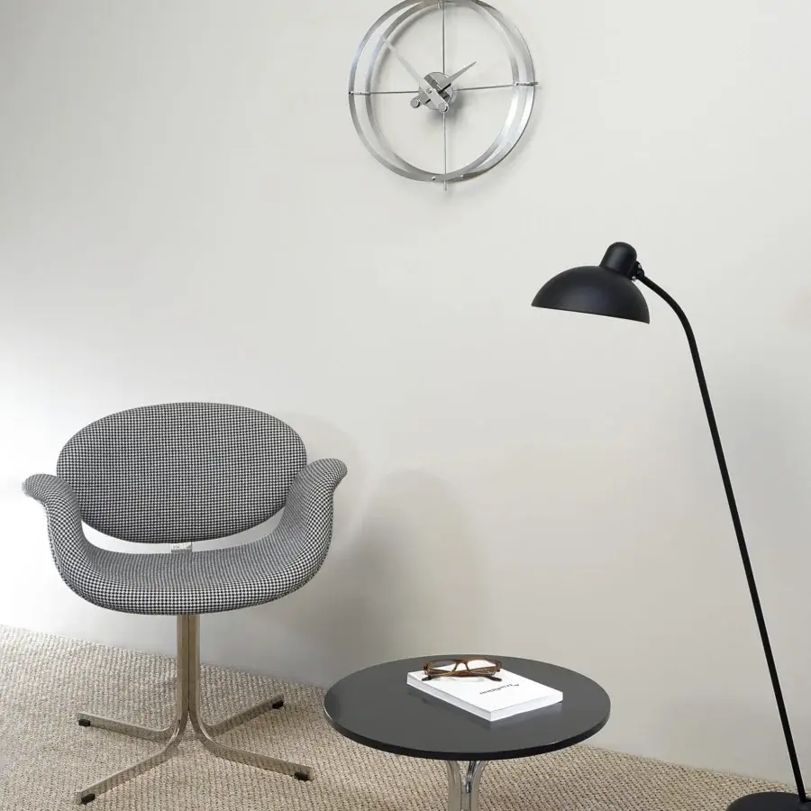 Superior Nomon Dos Puntos wall clock crafted in polished steel with intersecting lines and a silver tone
