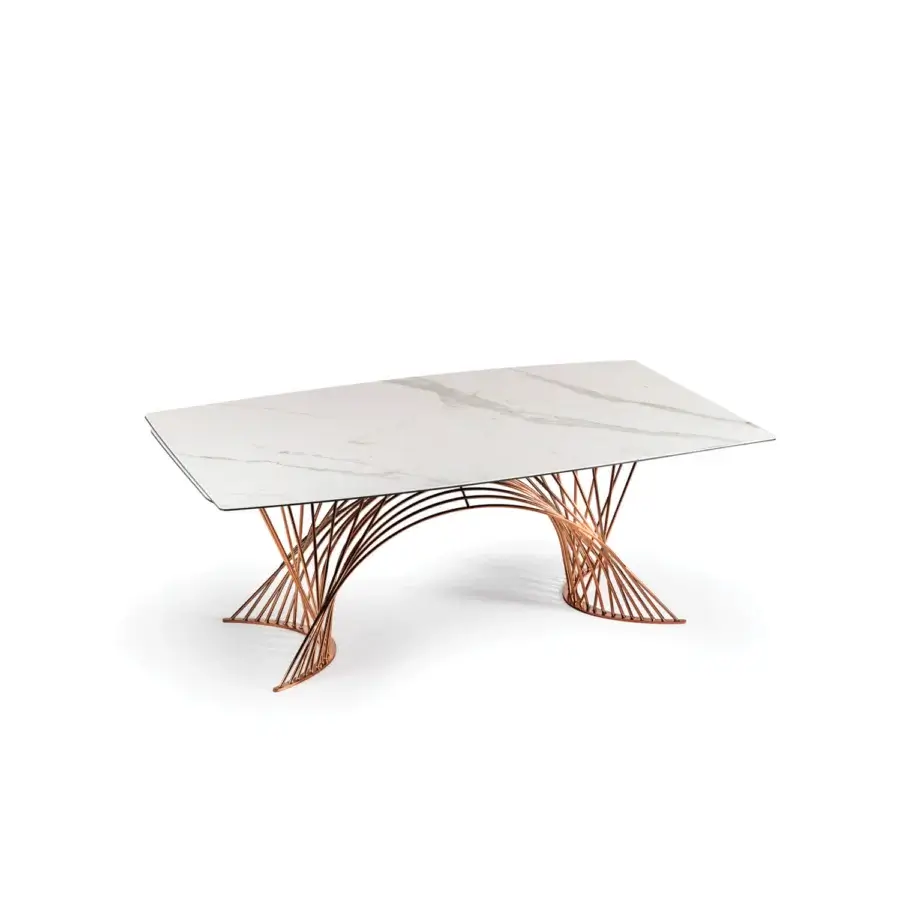 Superior Naos Latour table with refined ceramic tabletop in white and grey, built with a warm copper-toned satin metal base