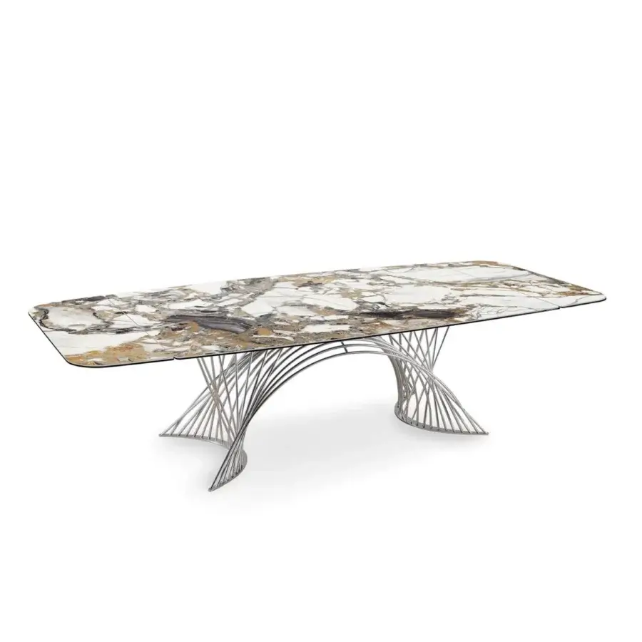 Elegant Naos Latour table with ceramic tabletop displaying white, grey and golden-brown veins plus a silver-toned painted metal base