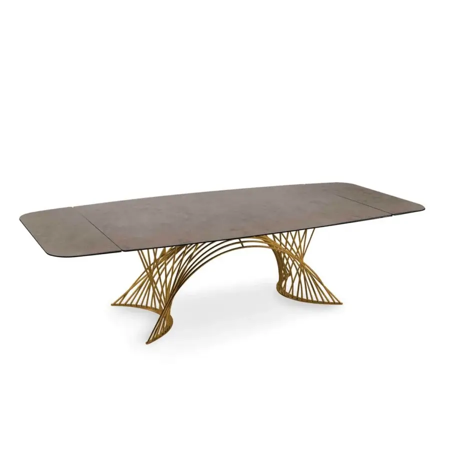 Exceptional Naos Latour table with a refined ceramic tabletop displaying subtle grey veining and a golden painted metal base