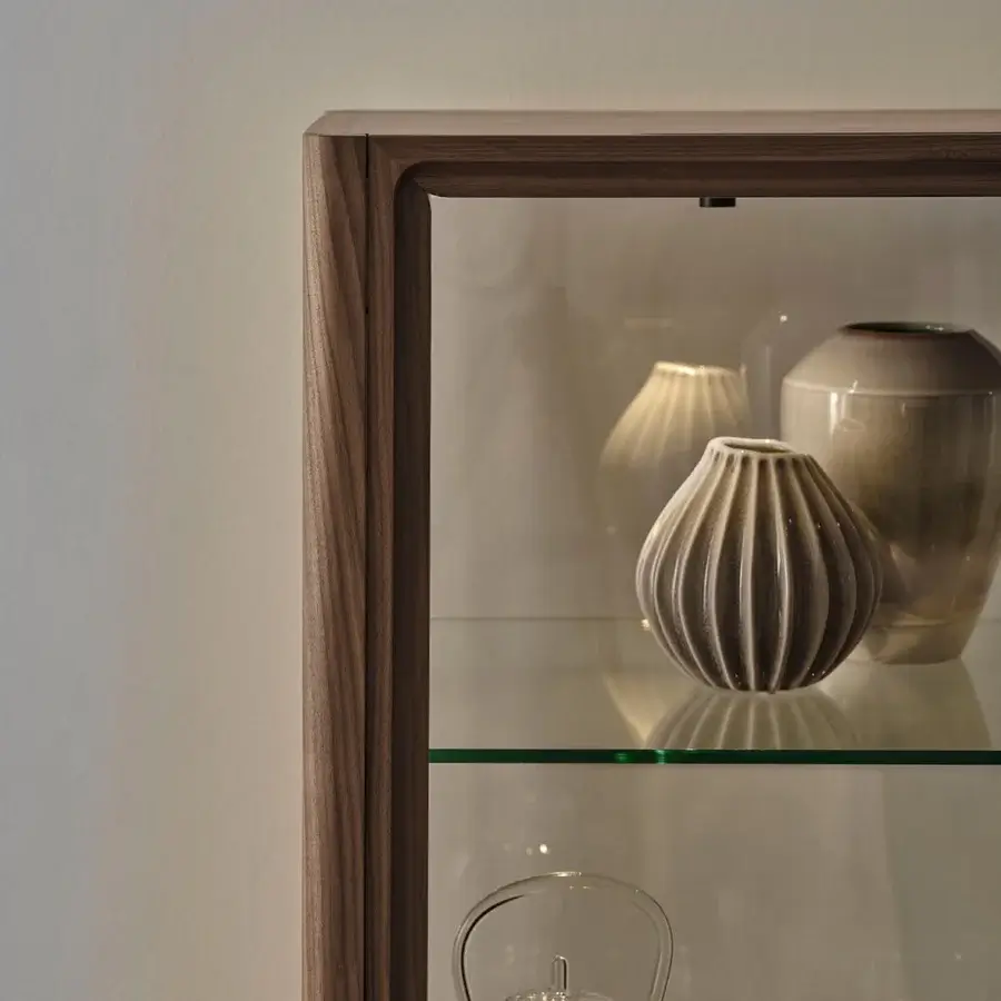 Distinguished Porada Atsuko cabinet with Canaletto walnut frame, matte black metal base and satin finish wood grain