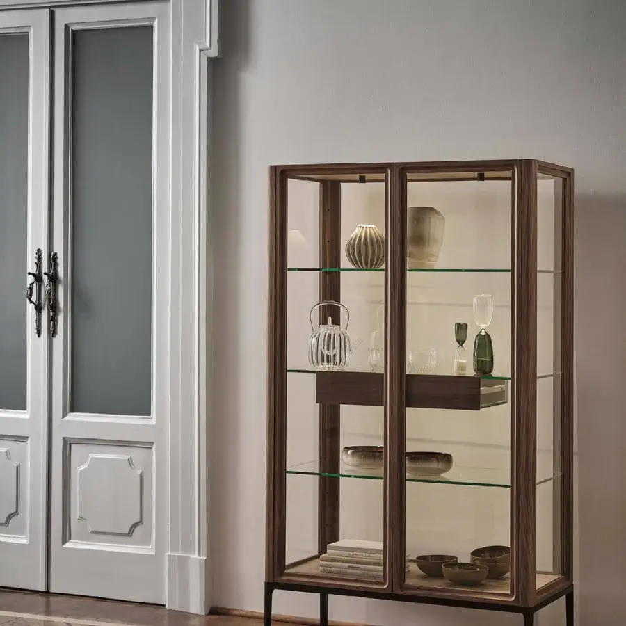 Exceptional Porada Atsuko cabinet crafted with Canaletto walnut, sleek matte black metal and clear glass shelving