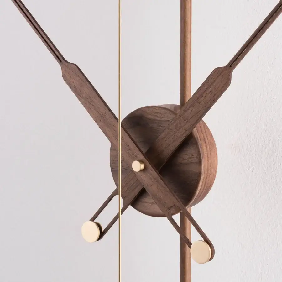 Elegant Nomon Barcelona Premium wall clock in wood with satin finish and polished brass accents