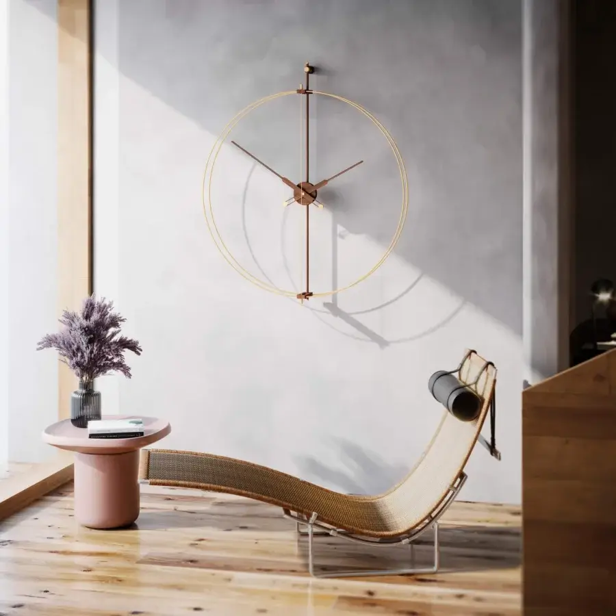 Elegant Nomon Barcelona Premium wall clock with double fiberglass and polished brass in a muted copper tone