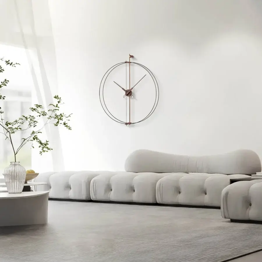 Superior Nomon Barcelona Premium wall clock crafted with double fiberglass and polished brass in a warm bronze tone