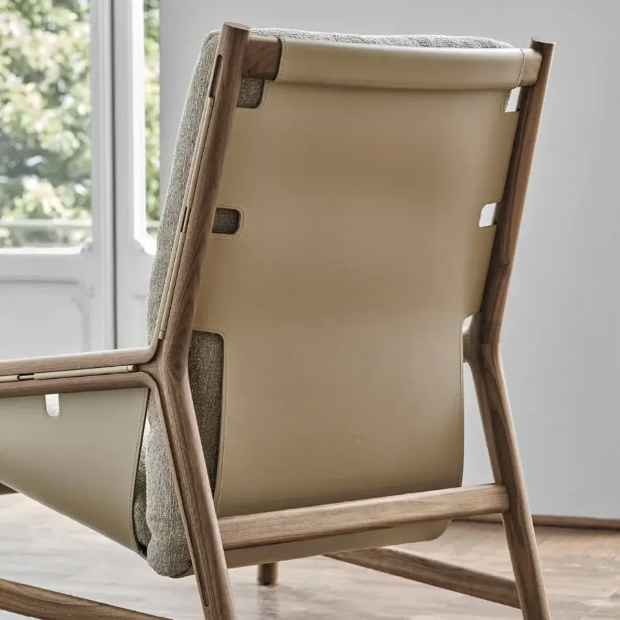 Superior Porada Bice armchair with Canaletto walnut frame, muted olive green Cuoietto leather and champagne metal detailing