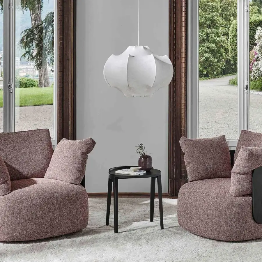 Lavish Porada Calin armchair with gracefully curved Canaletto walnut and enveloping dusty rose upholstery
