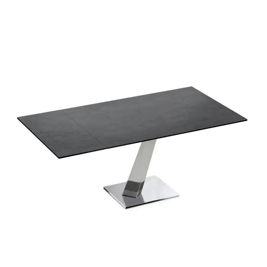 Distinguished Naos Help table with a refined glass tabletop and sculptural chromed metal base exhibiting a dark gray matte finish