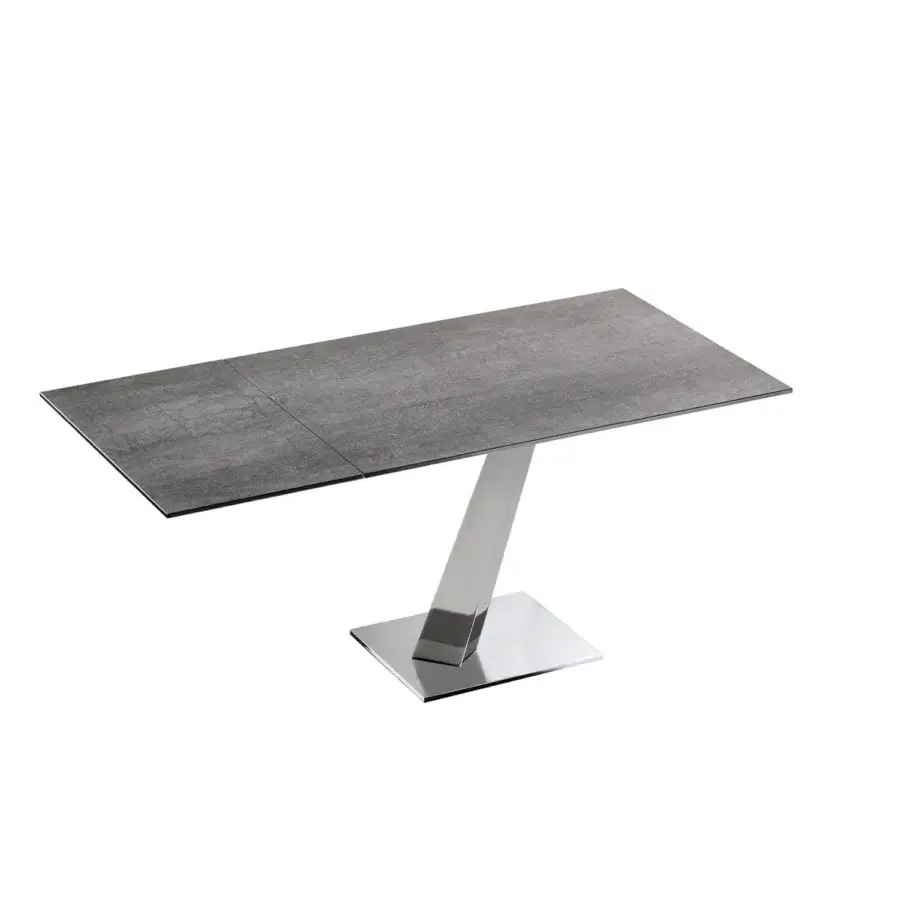 Superior Naos Help table with grey ceramic tabletop exhibiting a textured stone-like finish and polished metal base