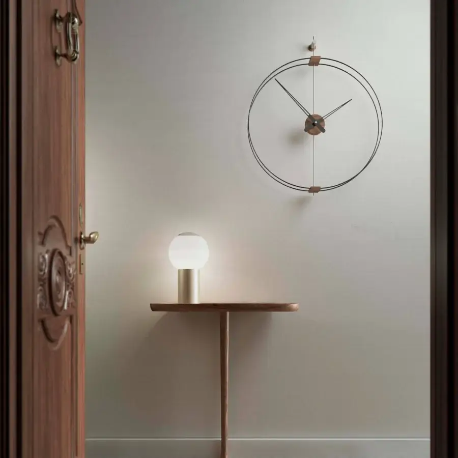 Distinguished Nomon Mini Barcelona wall clock crafted with black fiberglass and warm walnut components in a sleek finish