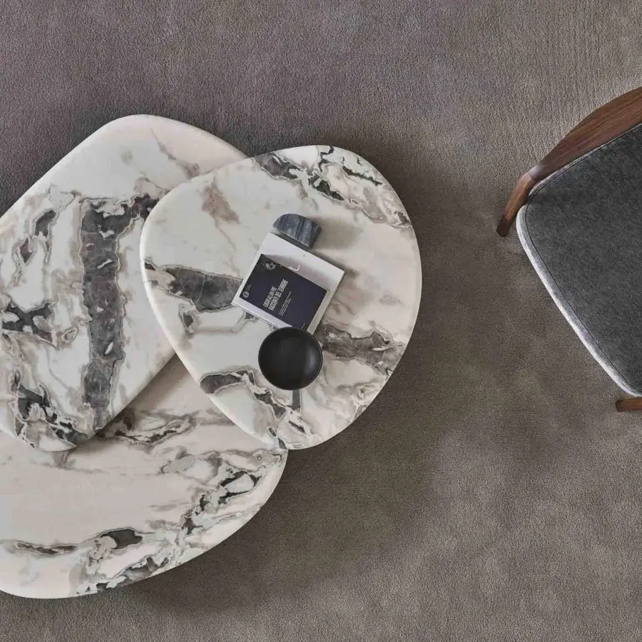 Exceptional Porada Callisto Mix coffee table crafted with Grey Carnico marble tops and Bronzoro-lacquered wooden base