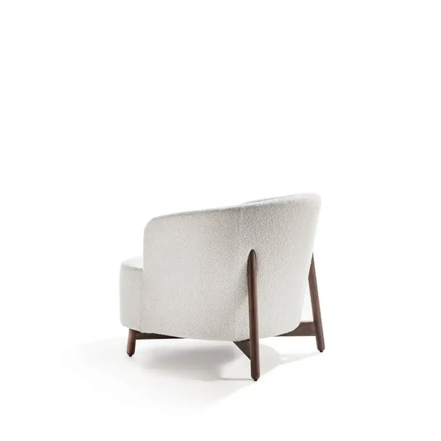 Exceptional Porada Copine armchair with soft shapes and textured bouclé fabric upholstery in an off-white hue with satin-finish wood frame
