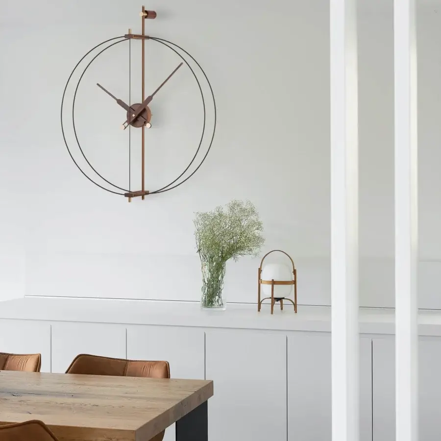 Elegant Nomon Mini Barcelona Premium wall clock crafted with double fiberglass and radiant polished brass
