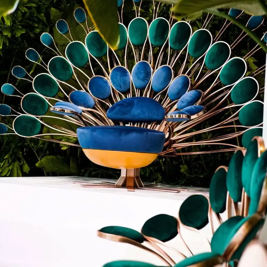 Distinguished Visionnaire Pavone Throne lounge chair crafted with glossy metal, hand-polished brass, and deep blue premium fabric upholstery