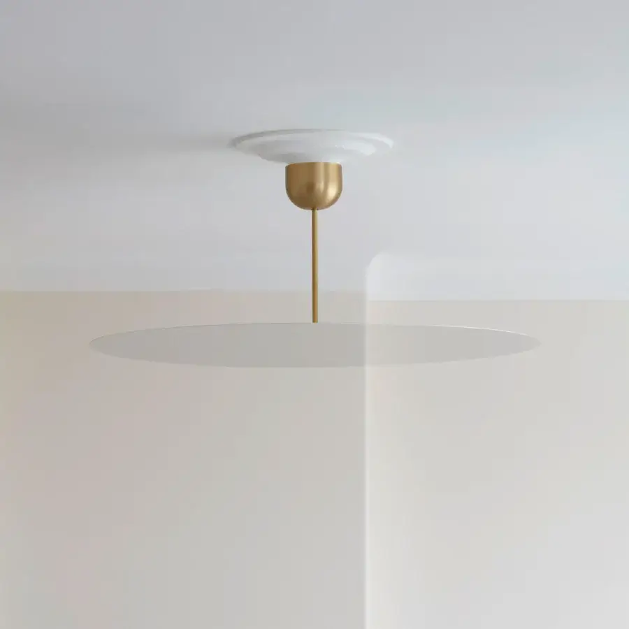 Exclusive Luceplan Millimetro suspension lamp in off-white and brassy gold with a mirror finish and seamless form