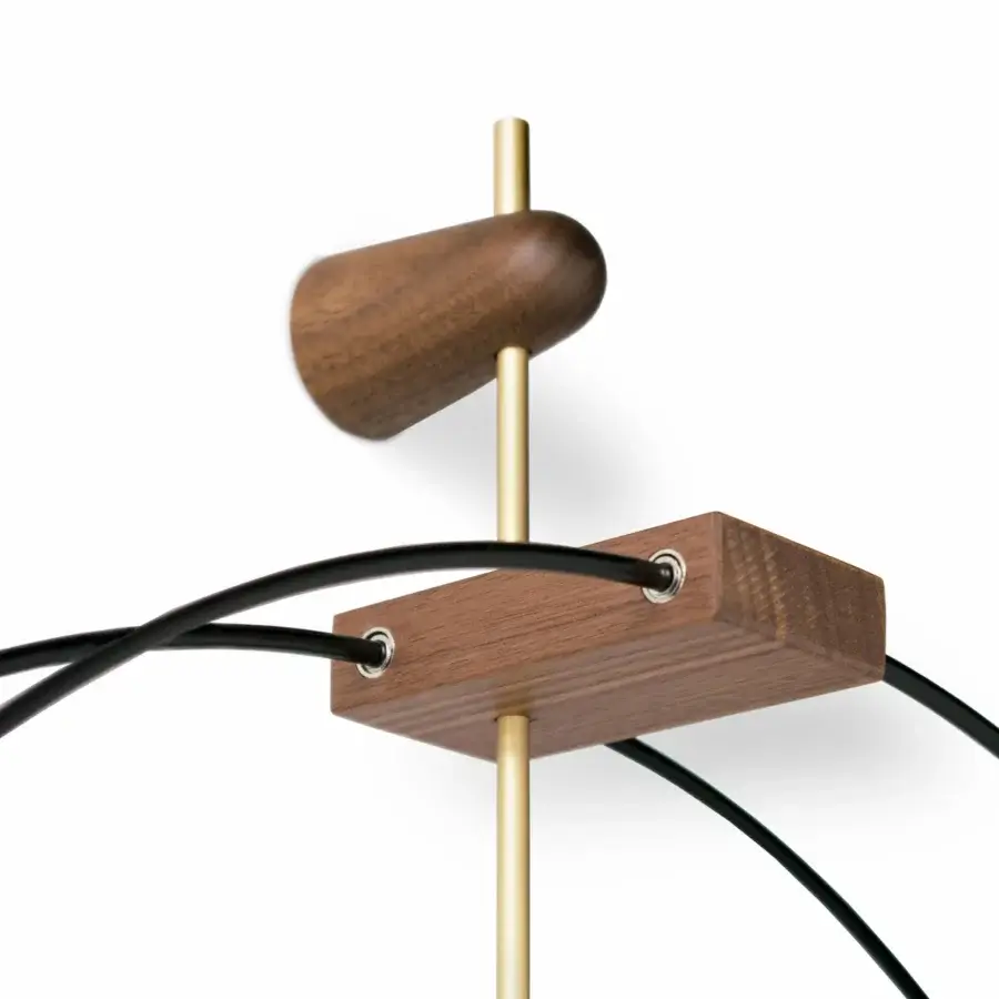 Captivating Nomon Micro Barcelona wall clock with black fiberglass framing elegant walnut and fine gold metal details with satin finish