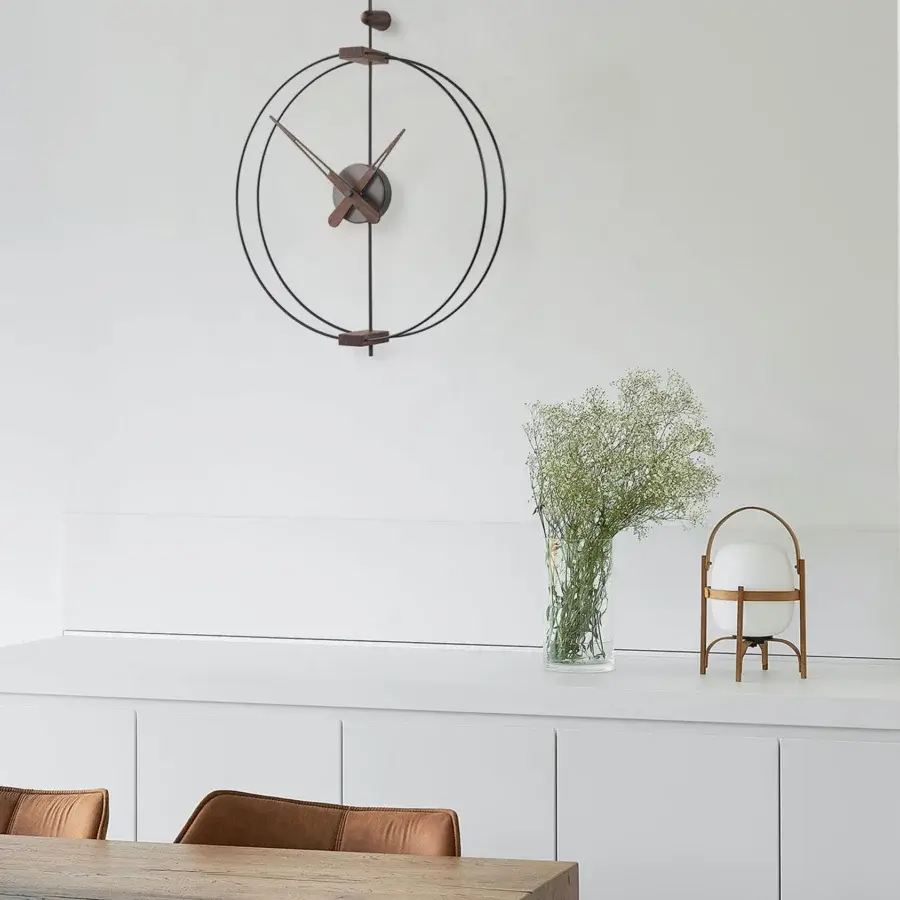 Exceptional Nomon Micro Barcelona wall clock with black fiberglass and elegant walnut elements in a matte finish