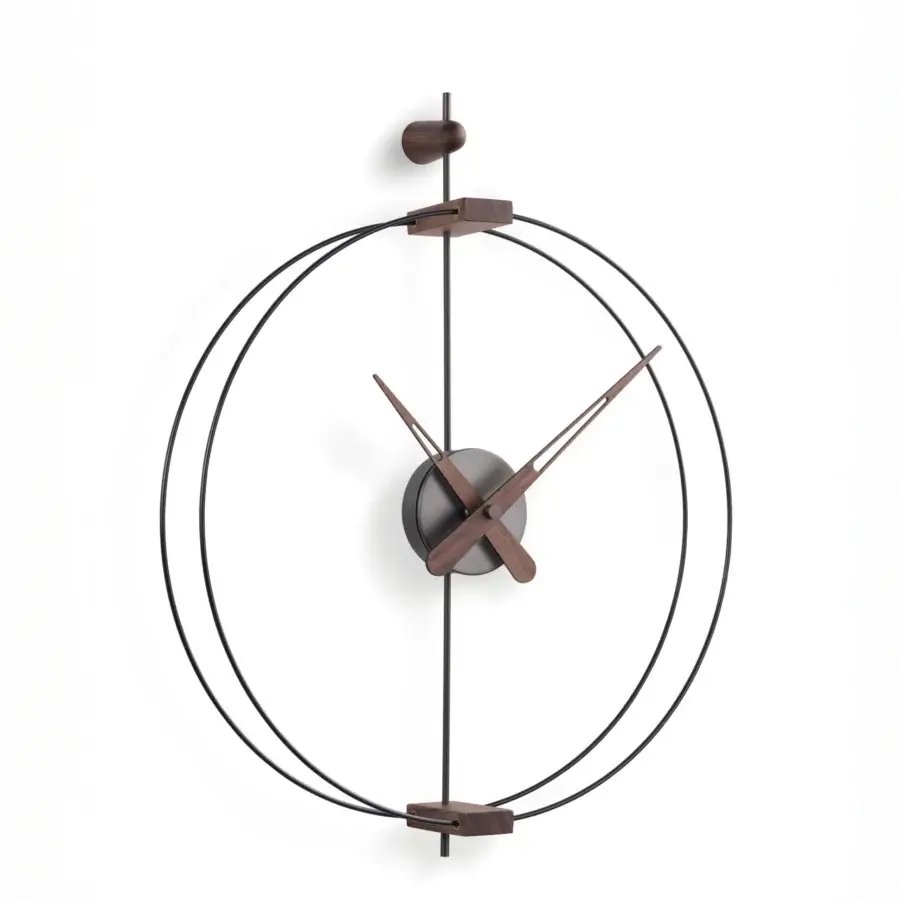 Elegant Nomon Micro Barcelona wall clock with a black fiberglass double ring framing walnut elements and fine metal details in a satin finish