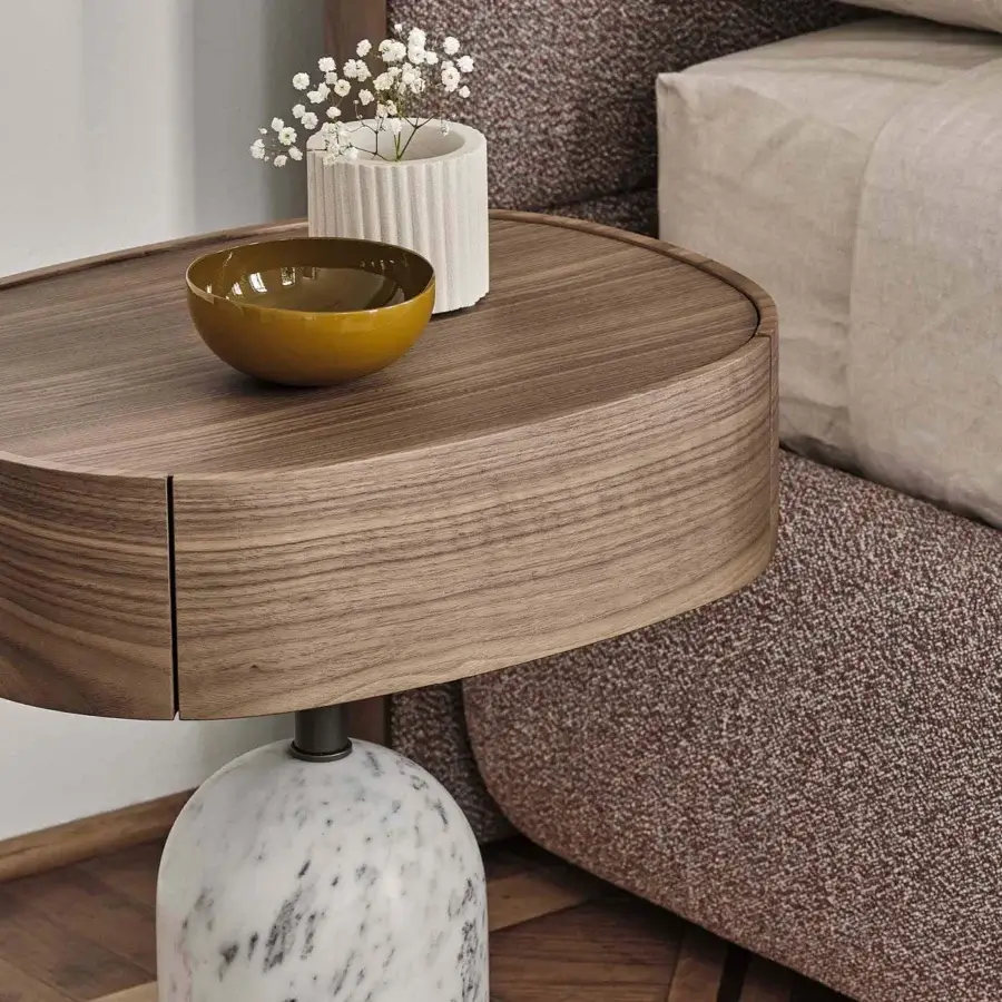 Elegant Porada Ekero nightstand with walnut finished wood and white Carrara marble, built upon a pewter metal stem