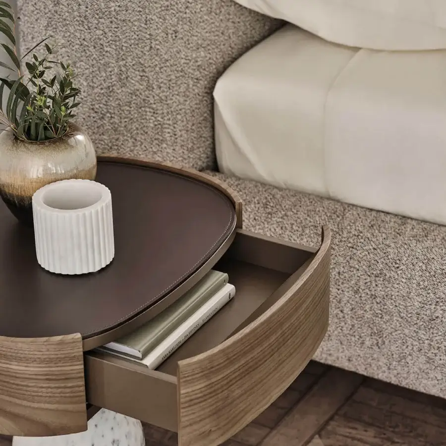 Distinguished Porada Ekero nightstand crafted in walnut with white Carrara marble and satin finish wood grain