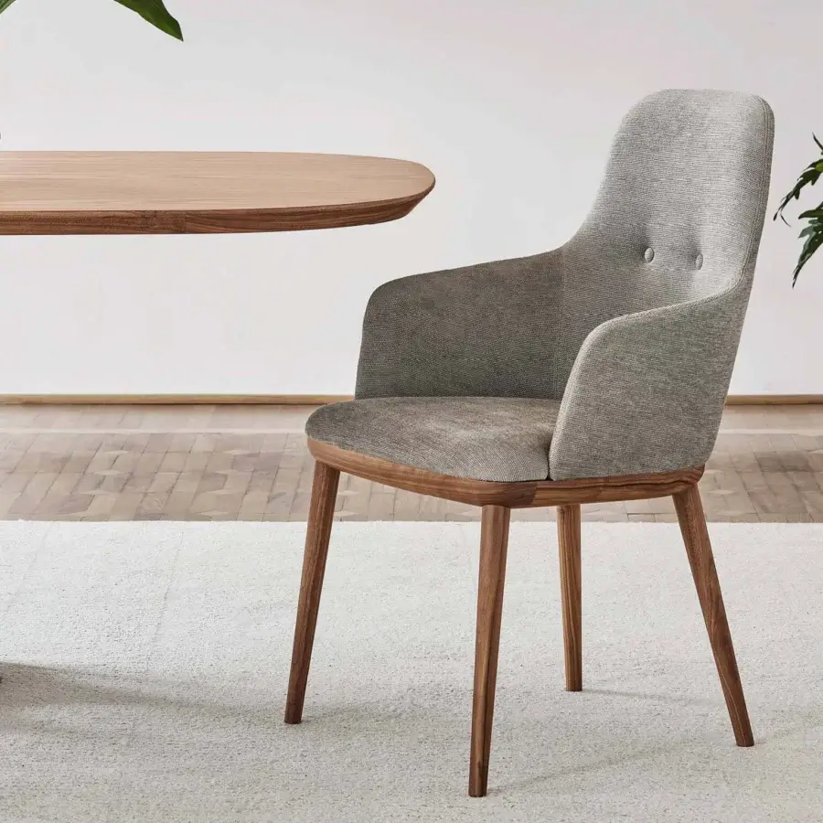 Elegant Porada Connie chair with muted gray textile upholstery and solid Canaletta Walnut wood frame with satin finish