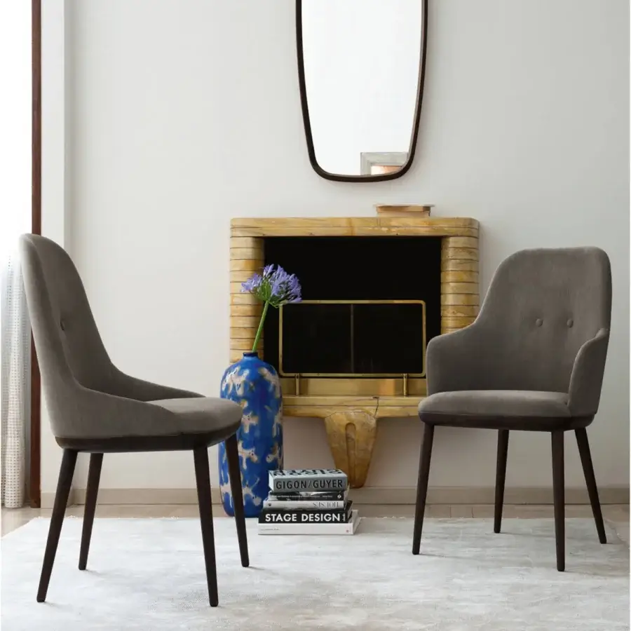 Distinguished Porada Connie chair crafted with Canaletta Walnut and muted gray textile upholstery with a stained finish