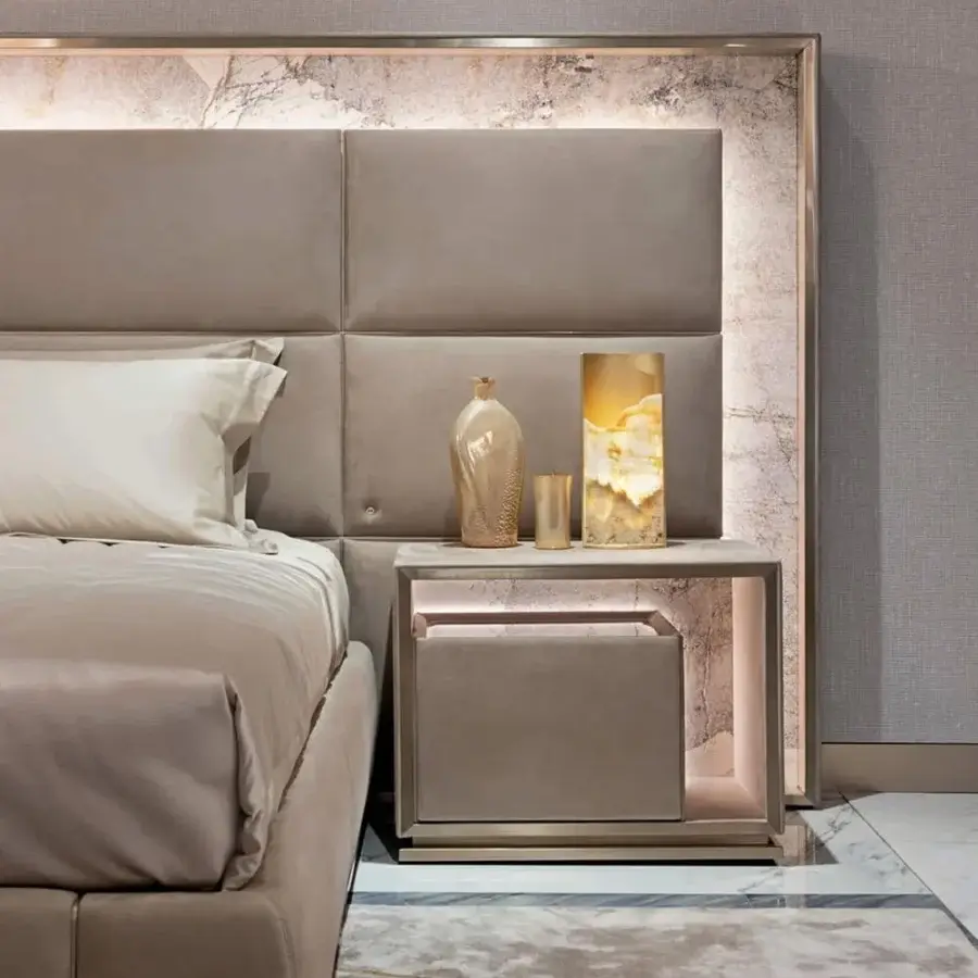 Superior Visionnaire Polaris lamp crafted with polished aluminum, backlit marble, and a sleek curved form