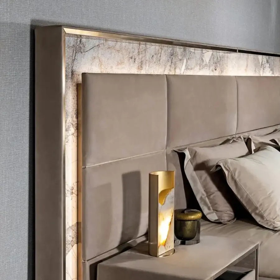 Elegant Visionnaire Polaris lamp crafted with polished aluminum, backlit marble, and a split-cut textured edge