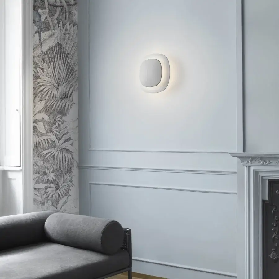 Elegant Luceplan Luthien wall lamp crafted in technopolymer with a refined white aluminum finish