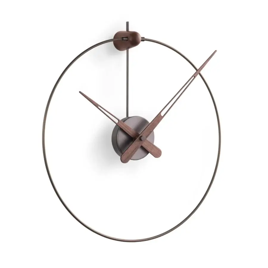 Distinguished Nomon Micro Anda wall clock with an ultra-slim metallic frame and contrasting walnut wood center and muted finish