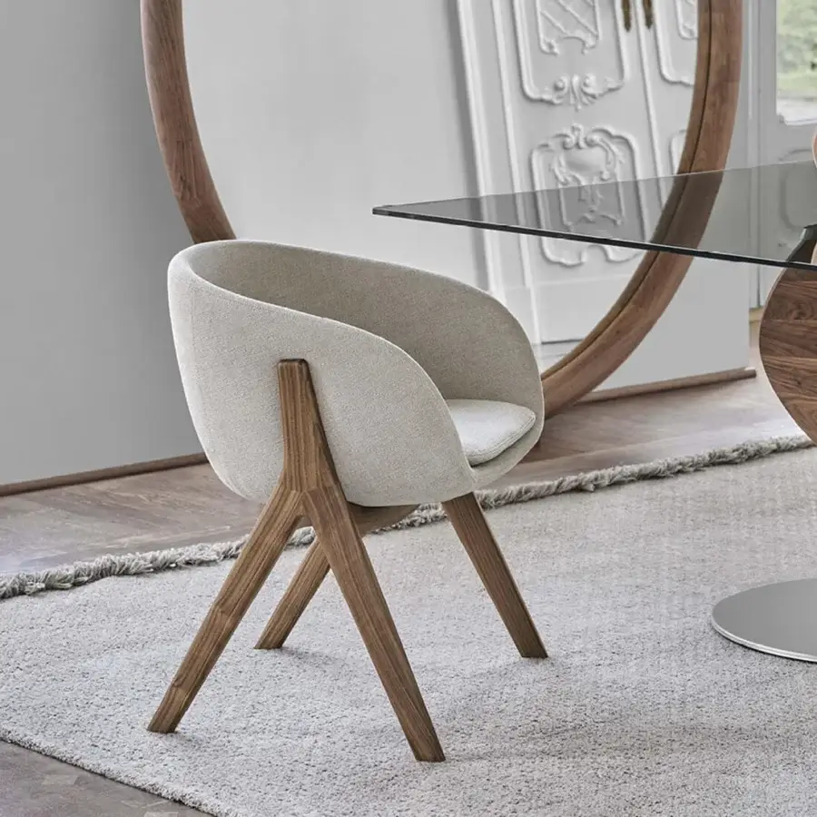 Superior Porada Lambda armchair with enveloping seat and sculpted solid canaletta walnut frame in satin finish