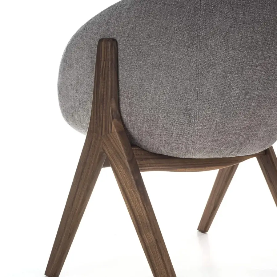 Elegant Porada Lambda armchair with solid canaletta walnut frame and generously sized seat in subtly textured gray textile