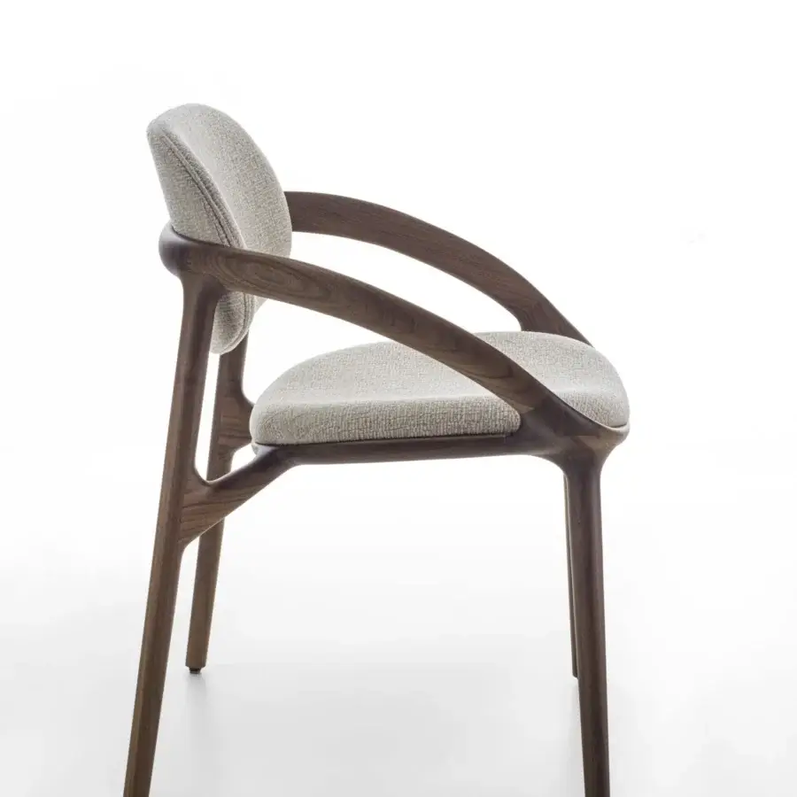 Exceptional Porada Molly armchair with a canaletto walnut frame and neutral beige upholstery in a satin finish
