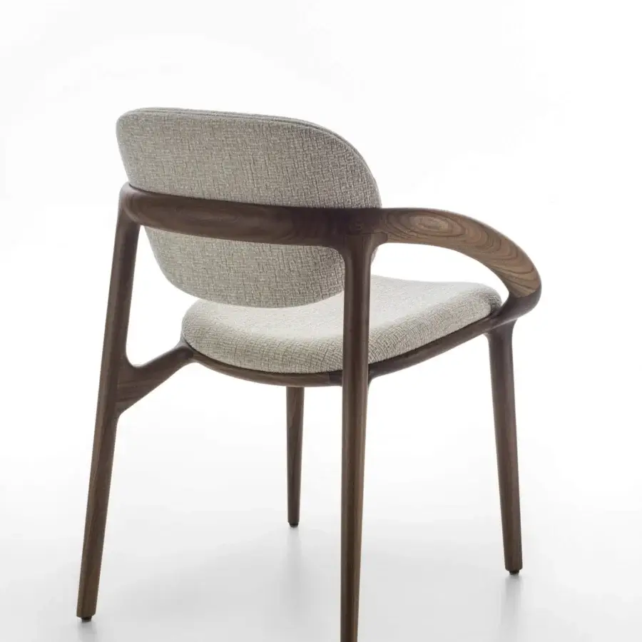 Distinguished Porada Molly armchair with a canaletto walnut frame and light beige upholstery in a satin finish