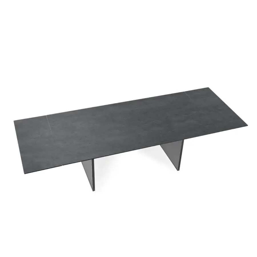 Distinguished Naos Santiago table with dark gray ceramic tabletop and luminous laminated-glass legs in textured matte finish