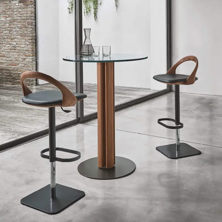 Elegant Porada Ester stool crafted from wood with a natural finish and dark textile upholstery with a matte black metal base