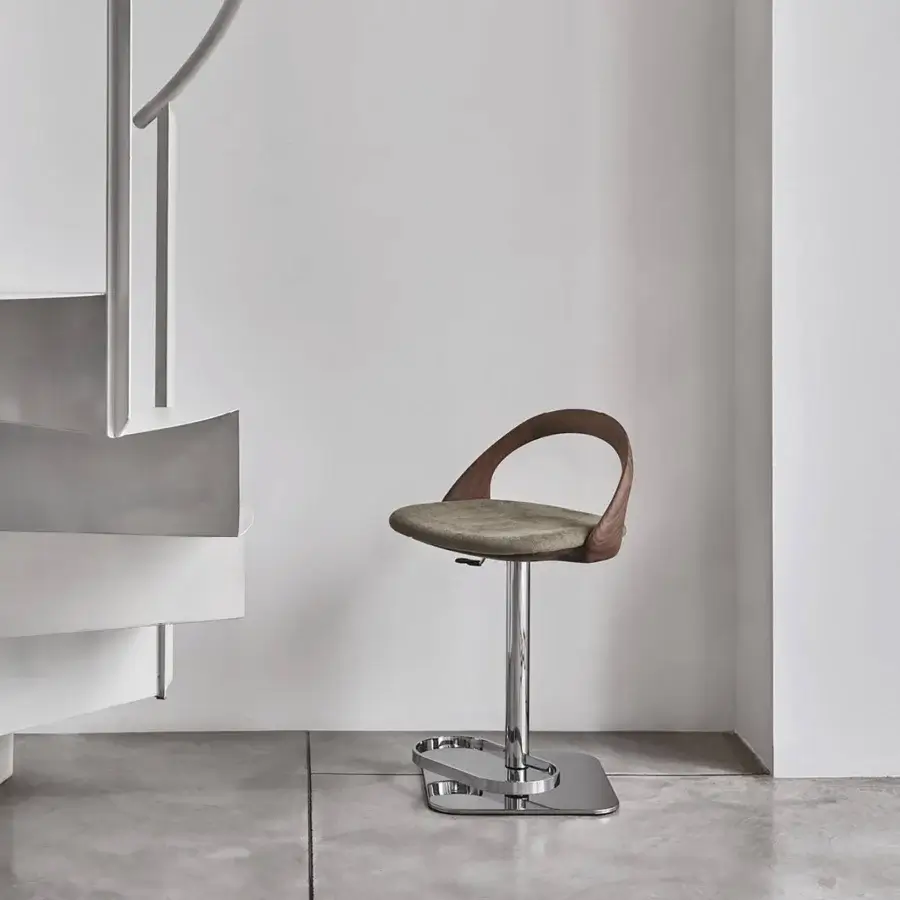 Exceptional Porada Ester stool crafted with natural wood and upholstered in muted olive-green textile with a polished chrome base