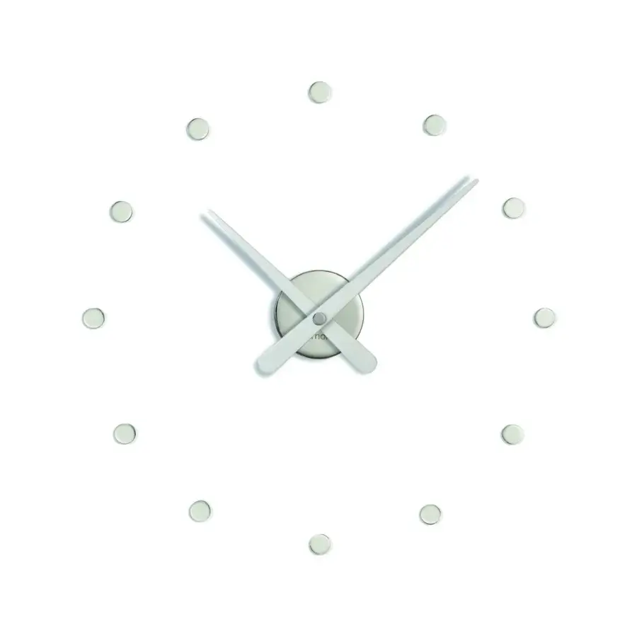 Exceptional Nomon Rodón Mini L wall clock with a white face and lacquered walnut hands